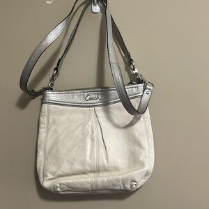 Cream cross body coach bag